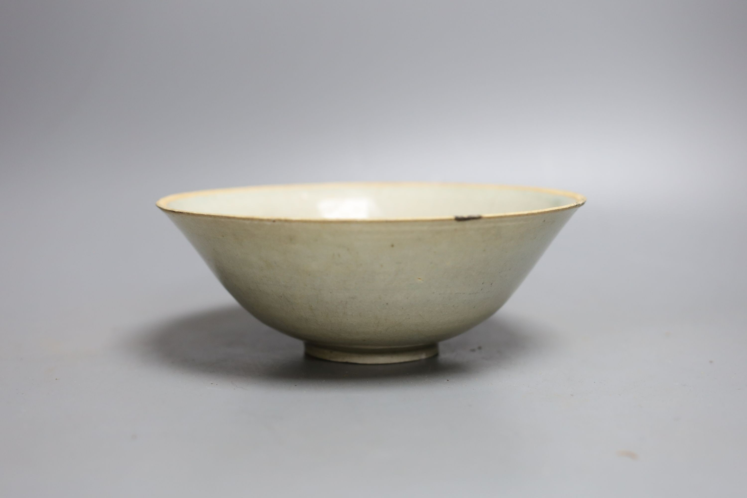 A Chinese Qingbai bowl and a Ge ware type shell dish, Yuan dynasty or later. Largest 18cm diameter